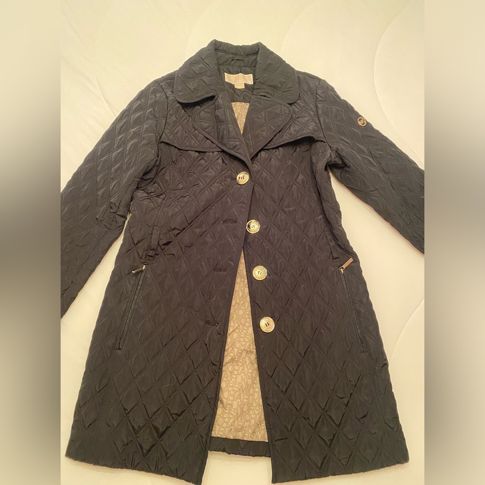 Medium Michael Kors black jacket with removable hood. Belt is not included